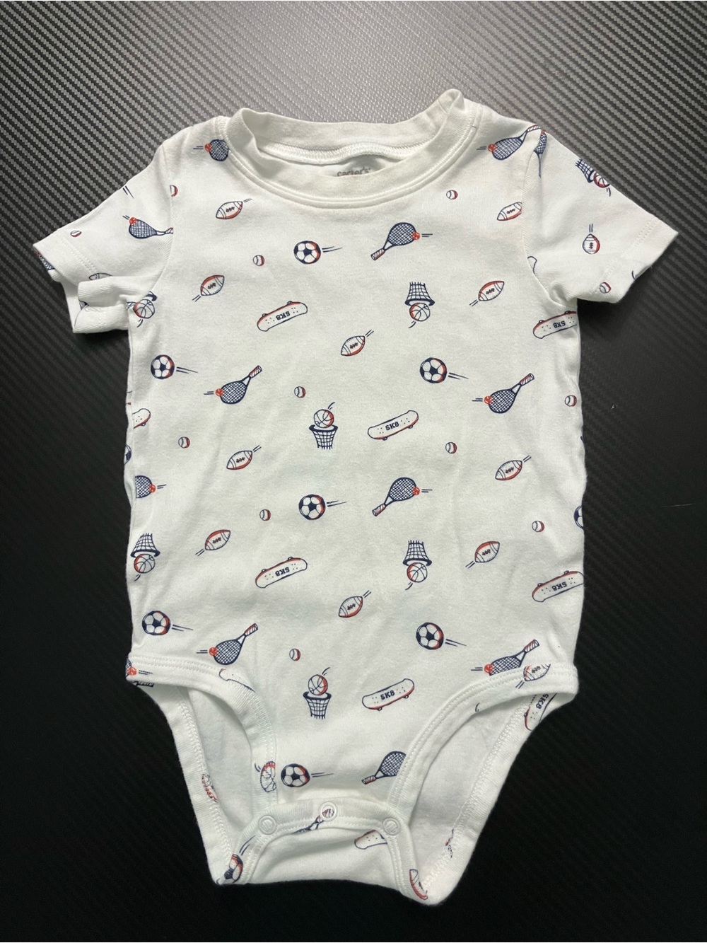 Carter's White Baby One-Piece with Navy and Red Sports Print